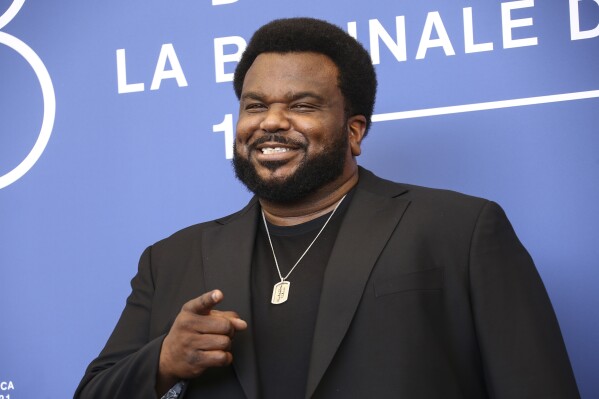 FILE - Craig Robinson poses for photographers at the photo call for the film 'Mona Lisa and the Blood Moon' during the 78th edition of the Venice Film Festival in Venice, Italy, Sunday, Sept. 5, 2021. Robinson is bringing one of television’s perennial underdog characters back into the viewing landscape next month. Peacock announced Tuesday, July 18, 2023, the premiere date for the Robinson-led comedy series “Killing It,” which will air Aug. 17 on the streaming service. (Photo by Joel C Ryan/Invision/AP, File)