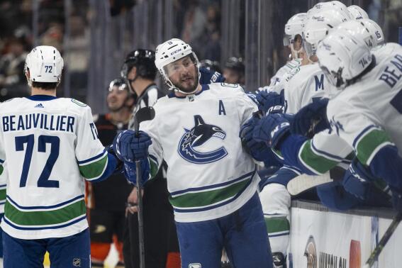 Kuzmenko's 1st NHL hat trick leads Canucks past Ducks