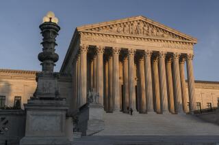 FILE - In this Nov. 6, 2020, file photo, the Supreme Court is seen at sundown in Washington. The state of California has agreed to pay more than $2 million in legal fees in a settlement with churches that challenged coronavirus closure orders. Church lawyers who successfully took their appeal to the U.S. Supreme Court said Wednesday, June 2, 2021, that the state agreed not to impose restrictions on houses of worship that are greater than those on retail businesses. (AP Photo/J. Scott Applewhite, File)