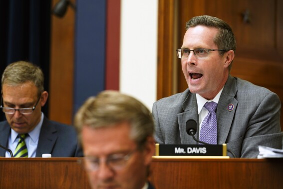 FILE - U.S. Rep. Rodney Davis, R-Ill., right, speaks during a House Committee on Transportation and Infrastructure on Capitol Hill in Washington, May 18, 2022. The Federal Election Commission has fined the campaign fund of former Illinois Congressman Davis and its treasurer $43,475 for failing to refund excess contributions in a timely manner. (AP Photo/Mariam Zuhaib, File)
