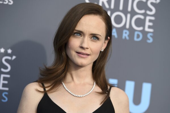 FILE - This Jan. 11, 2018 file photo shows Alexis Bledel at the 23rd annual Critics' Choice Awards in Santa Monica, Calif. Cybersecurity firm McAfee on Monday crowned Bledel the most dangerous celebrity on the internet in 2019. No other celebrity was more likely to land users on websites that carry viruses or malware.  (Photo by Jordan Strauss/Invision/AP, File)