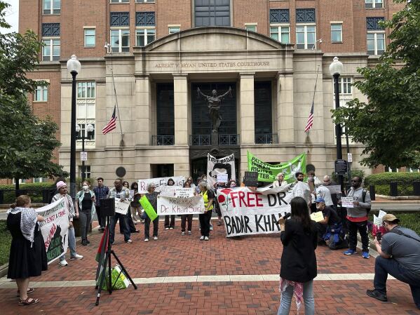 Pro-Palestinian protestors call for the release of Georgetown University scholar Badar Khan Suri, during a hearing for his case at the Federal District Court of the Eastern District of Virginia, in Alexandria, Va., Wednesday, May 1, 2025 (AP Photo/Nathan Ellgren)