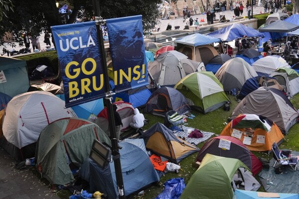 FILE - Tents are placed on an encampment on the UCLA campus after clashes between pro-Israel and pro-Palestinian groups, Wednesday, May 1, 2024, in Los Angeles. Police, late Monday, June 10, 2024, thwarted attempts by pro-Palestinian demonstrators to set up a new encampment at the University of California, Los Angeles, where officers cleared a previous camp this spring after it was attacked by counterprotesters. Approximately 25 people were arrested late Monday for willful disruption of university operations and one for interfering with an officer, UCLA police said in a statement. (AP Photo/Jae C. Hong, File)