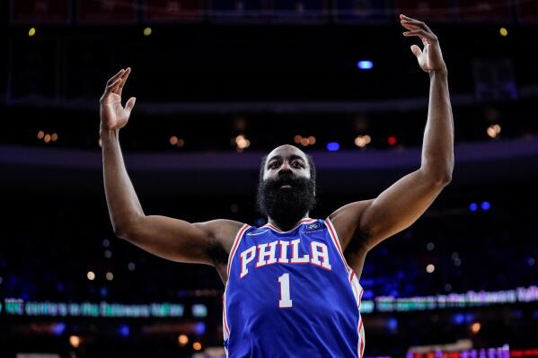 FILE - Philadelphia 76ers' James Harden gestures during the first half of Game 3 of the team's NBA basketball second-round playoff series against the Miami Heat, May 6, 2022, in Philadelphia. A person familiar with the situation said Harden chose not to exercise his $47.4 million option for next season and will become a free agent — but with no designs on leaving Philadelphia. Harden made the decision to allow the 76ers the flexibility they need to sign other players this summer, said the person who spoke to The Associated Press on condition of anonymity because neither side confirmed those plans publicly. (AP Photo/Matt Slocum, File)