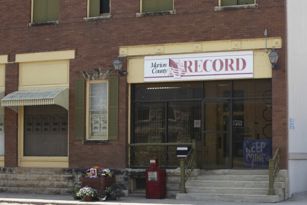FILE - The offices of the Marion County Record weekly newspaper are seen in Marion, Kan., on Aug. 21, 2023. On Friday, March 29, 2024, an office manager at the paper filed a lawsuit in federal court alleging she was unlawfully detained and interrogated, and had her cellphone seized during a 2023 police raid that sparked a firestorm. (AP Photo/John Hanna, File)