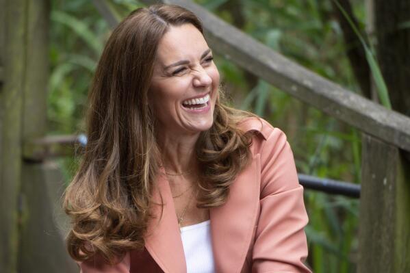 FILE - Britain's Kate, the Duchess of Cambridge visits the Urban Nature Project at the Natural History Museum, in London, June 22, 2021. The Duchess of Cambridge, who turns 40 on Sunday Jan. 9, 2022, has emerged as Britain’s reliable royal. After Prince Harry and Meghan’s stormy departure to California in 2020, the death of Prince Philip last year, and now sex abuse allegations against Prince Andrew, the former Kate Middleton remains in the public eye as the smiling mother of three who can comfort grieving parents at a children's hospice or wow the nation by playing piano during a televised Christmas concert. (Geoff Pugh/Pool Photo via AP, File)