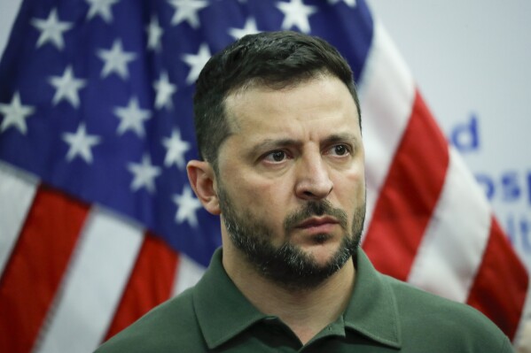 Ukrainian President Volodymyr Zelenskyy speaks to wounded Ukrainian soldiers during a visit at Staten Island University Hospital, in New York, Monday, Sept. 18, 2023. (AP Photo/Eduardo Munoz, Pool)