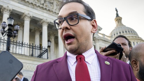 FILE - U.S. Rep. George Santos, R-N.Y., speaks to reporters outside the Capitol, in Washington, May 17, 2023. Santos, charged with a host of financial crimes, including embezzling money from his campaign, withdrew $85,000 from his campaign to help repay hundreds of thousands of dollars he loaned himself to get elected in 2022. (AP Photo/J. Scott Applewhite, File)