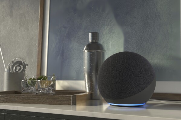 This image provided by Amazon, shows an Amazon Echo device. Amazon has unveiled a slew of gadgets and an update to its popular voice assistant Alexa, infusing it with more generative AI features to better compete with other tech companies who've rolled out flashy chatbots. During a demonstration in Washington D.C. on Wednesday, Sept. 20, 2023, Amazon’s devices chief Dave Limp said the latest language model will allow consumers to have more human-like conversations with a “smarter and more conversational” Alexa. (Amazon via AP)