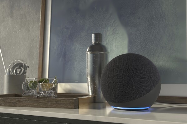 This image provided by Amazon, shows an Amazon Echo device. Amazon has unveiled a slew of gadgets and an update to its popular voice assistant Alexa, infusing it with more generative AI features to better compete with other tech companies who've rolled out flashy chatbots. During a demonstration in Washington D.C. on Wednesday, Sept. 20, 2023, Amazon’s devices chief Dave Limp said the latest language model will allow consumers to have more human-like conversations with a “smarter and more conversational” Alexa. (Amazon via AP)