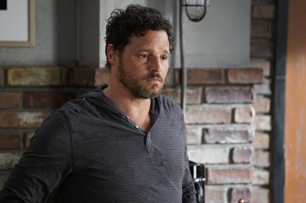 This image released by ABC shows Justin Chambers in a scene from "Grey's Anatomy." Chambers, who played Alex Karev on the show, left last season after a 15-year run. (Kelsey McNeal/ABC via AP)