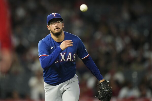 García, Dunning push Rangers to the brink of a playoff berth in a 5-0 win  over the Angels, National