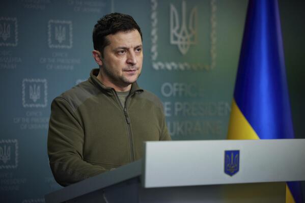 In this photo provided by the Ukrainian Presidential Press Office, Ukrainian President Volodymyr Zelenskyy delivers his speech addressing the nation in Kyiv, Ukraine, Friday, Feb. 25, 2022. Russian troops bore down on Ukraine's capital Friday, with explosions and gunfire sounding in the city as the invasion of a democratic country fueled fears of wider war in Europe and triggered new international efforts — including direct sanctions on President Vladimir Putin — to make Moscow stop. (Ukrainian Presidential Press Office via AP)
