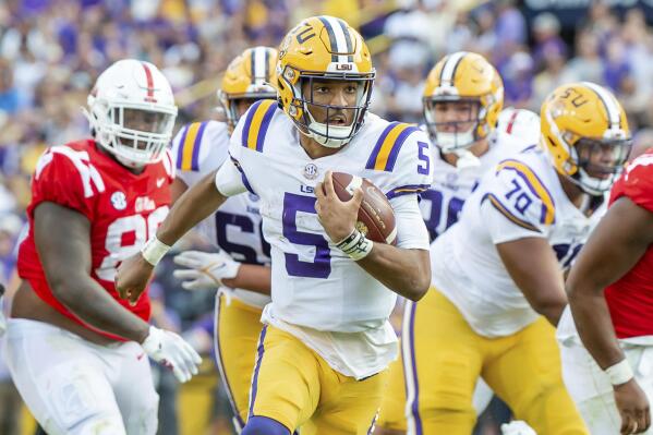 LSU quarterback Jayden Daniels scores a touchdown agaanst Mississippi during an NCAA college football game at Tiger Stadium in Baton Rouge, La, Saturday, Oct. 22, 2022. (Scott Clause/The Daily Advertiser via AP)