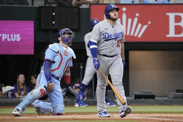 Rangers beat Dodgers 8-4 to avoid sweep; LA's Muncy hits grand slam