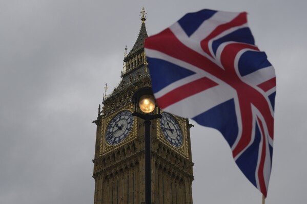 A Union flag is displayed outside the Houses of Parliament, in London, Thursday, May 23, 2024.(AP Photo/Kin Cheung, File)