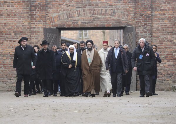 A delegation of Muslim religious leaders visit Auschwitz together with a Jewish group in what organizers called “the most senior Islamic leadership delegation" to visit the former Nazi death camp, in Oswiecim, Poland on Thursday Jan. 23, 2020. The interfaith visit comes on International Holocaust Remembrance Day, just days before the 75th anniversary of the  Jan. 27, 1945, liberation of the death camp by Soviet forces. (American Jewish Committee via AP)