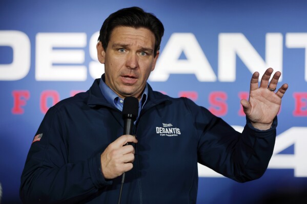 FILE - Republican presidential candidate Florida Gov. Ron DeSantis speaks during a campaign event at Wally's bar, Wednesday, Jan. 17, 2024, in Hampton, N.H. A federal judge on Wednesday dismissed Disney's First Amendment lawsuit against Gov. Ron DeSantis, leaving the company's hope of regaining control of a district that governs Walt Disney World in its fight in another state court challenge. (AP Photo/Michael Dwyer, File)