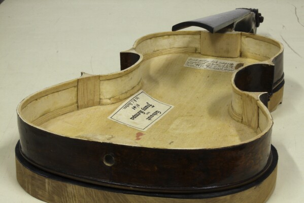 A secret note in Dachau-built 'Violin of Hope' tells a tale of survival | AP News