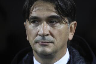 FILE - In this Saturday, Nov. 16, 2019 file photo, Croatia coach Zlatko Dalic looks at the field prior to the Euro 2020 group E qualifying soccer match between Croatia and Slovakia at the Rujevica stadium in Rijeka, Croatia. The last two World Cup winners (Joachim Loew of Germany and Didier Deschamps of France). The defending European champion (Fernando Santos of Portugal). And a World Cup finalist (Zlatko Dalić of Croatia). Not to mention a Champions League winner (Luis Enrique of Spain) and a Premier League champion (Roberto Mancini of Italy). There is no shortage of accomplished coaches at the European Championship. (AP Photo/Daniel Kasap, File)