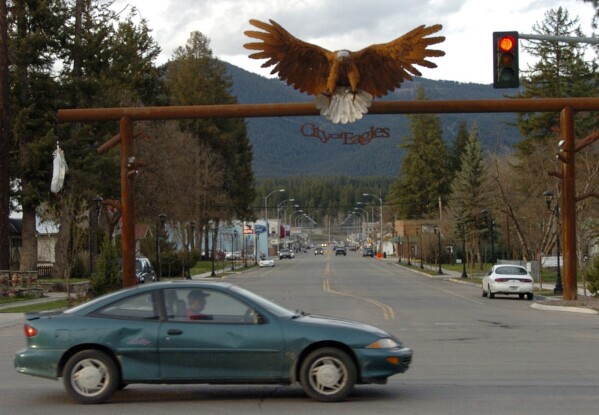 FILE - In this April 27, 2011, file photo, the entrance to downtown Libby, Mont., is seen. BNSF Railway attorneys are expected to argue before jurors Friday, April 19, 2024, that the railroad should not be held liable for the lung cancer deaths of two former residents of the asbestos-contaminated Montana town, one of the deadliest sites in the federal Superfund pollution program. (AP Photo/Matthew Brown, File)