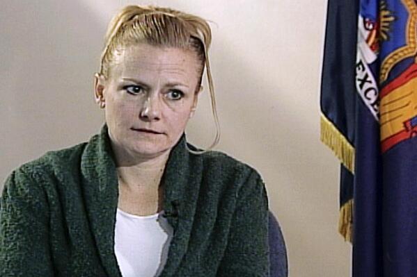 FILE — In this 2010 image taken from video, courtesy of WMUR television of Manchester, N.H., Pamela Smart is shown during an interview at the corrections facility, in Bedford Hills, N.Y.  Smart, a former high school employee convicted of recruiting her teenage lover to kill her husband, was denied a sentence reduction hearing Wednesday, March 23, 2022, more than 30 years after a sensational trial that inspired books and a Nicole Kidman movie.(WMUR Television via AP, File)