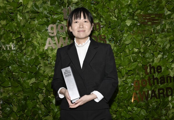 Celine Song poses with the award for best feature at the Gotham Independent Film Awards at Cipriani Wall Street on Monday, Nov. 27, 2023, in New York. (Photo by Evan Agostini/Invision/AP)