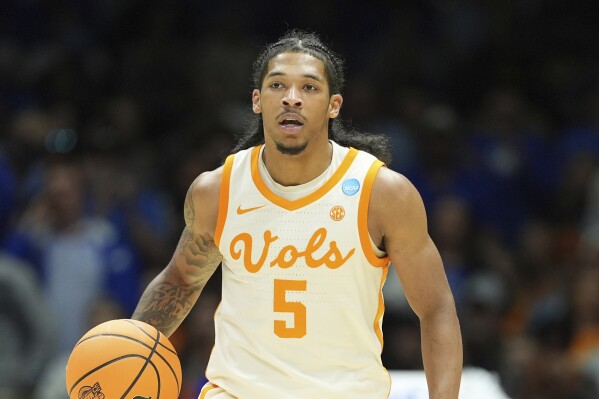 Tennessee's Zakai Zeigler in action during the second half in the Sweet 16 of the NCAA college basketball tournament against Kentucky Friday, March 28, 2025, in Indianapolis. (AP Photo/Michael Conroy,File)
