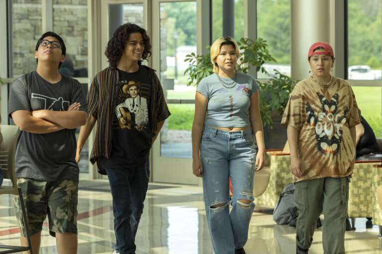 This image released by FX shows, from left, Lane Factor as "Cheese", D'Pharaoh Woon-A-Tai as Bear, Elva Guerra as Jackie, Paulina Alexia as Willie Jack, in a scene from the series "Reservation Dogs." (Shane Brown/FX via AP)