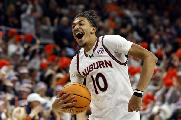 Auburn guard Chad Baker-Mazara reacts after the team's win over Mississippi in an NCAA college basketball game Saturday, Jan. 20, 2024, in Auburn, Ala. (AP Photo/Butch Dill)