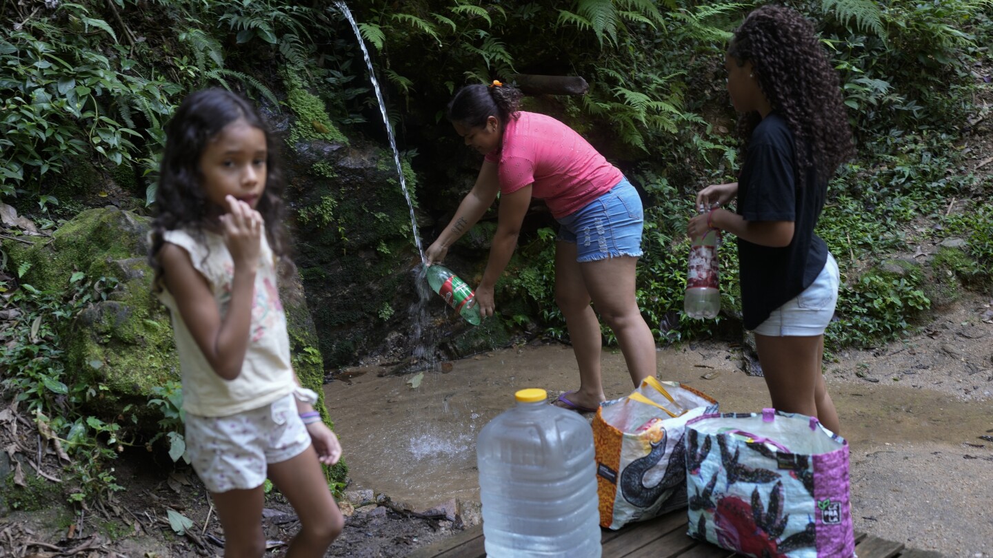 AP PHOTOS: Water, abundant for some and scarce for others, highlights inequalities of climate change