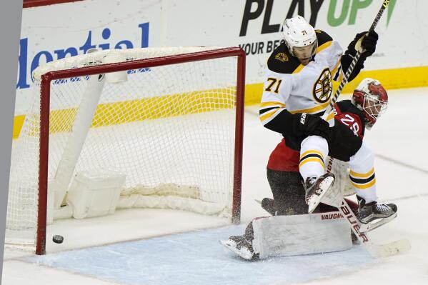 Zacha's 2 goals give Devils 4-3 OT win over Bruins