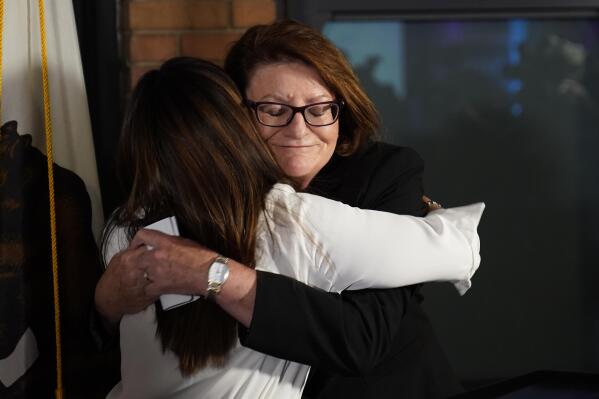 California state Senate President Pro Tempore Toni Atkins, right, hugs Jodie Hicks, chief executive officer and president of Planned Parenthood Affiliates of California, at a gathering in support of Proposition 1, in Sacramento, Calif., Tuesday, Nov. 8, 2022. Abortion rights supporters won in the four states where access was on the ballot Tuesday, as voters enshrined it into the state constitution in battleground Michigan as well as blue California and Vermont and dealt a defeat to an anti-abortion measure in deep-red Kentucky.  (AP Photo/Rich Pedroncelli)