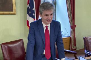 FILE—In this file photo from June 8, 2021, Ohio Senate Finance Chairman Matt Dolan, a Republican from Chagrin Falls, talks about the state's $75 billion budget in Columbus, Ohio. Dolan launched a listening tour Monday to explore a bid for Ohio's open U.S. Senate seat, casting himself as a pragmatic conservative who can be tough without adopting the vitriolic tone of some of his Trump-aligned rivals. (AP Photo/Andrew Welsh-Huggins, File)