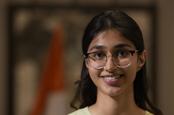 Manya Sachdev, 22, a student of computer science talks to the Associated Press about key issues in the national elections, in New Delhi, India, March 29, 2024. “I'm very aware of the need to find stable employment, and I'll be looking at each party's track records and plans in that area before deciding who to vote for," said Manya. (AP Photo/Manish Swarup)