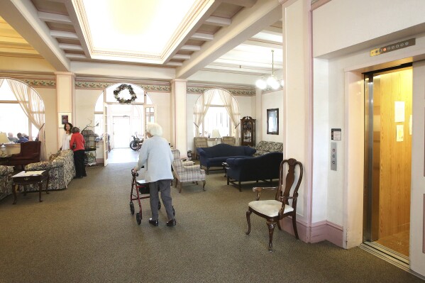 FILE - Bret Harte Retirement Inn residents make their way down to the dining room for lunch, May 6, 2020, in Grass Valley, Calif. By the end of the century, the U.S. population will be declining without substantial immigration, senior citizens will outnumber children and the share of white residents who aren't Hispanic will be less than half of the population, according to population projections released Thursday, Nov. 9, 2023 by the U.S. Census Bureau. (Elias Funez/The Union via AP, File)