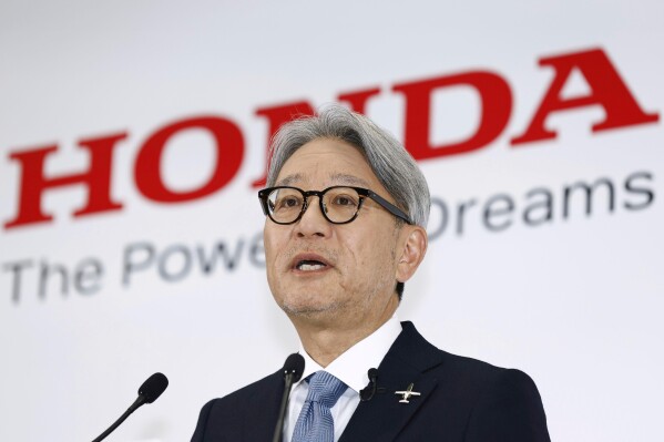 Honda Chief Executive Toshihiro Mibe speaks during a news conference in Tokyo, Japan, Tuesday, May. 20, 2025. (Kyodo News via AP)