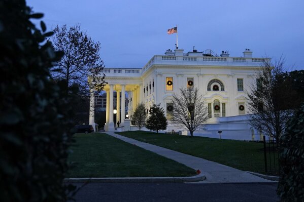 Dusk settles over the White House, Wednesday, Nov. 25, 2020, in Washington. (AP Photo/Patrick Semansky)