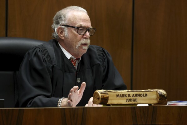 Judge Mark S. Arnold speaks to attorneys before opening remarks in the trial of Rakim Mayers, aka A$AP Rocky, at the Clara Shortridge Foltz Criminal Justice Center in downtown Los Angeles, Friday, Jan. 24, 2025. (Genaro Molina/Los Angeles Times via AP, Pool)