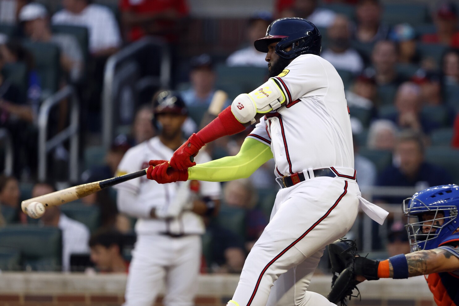 Atlanta, GA, USA. 09th Apr, 2022. Atlanta Braves outfielder Marcell Ozuna  hits a double during the third inning of a MLB game against the Cincinnati  Reds at Truist Park in Atlanta, GA.
