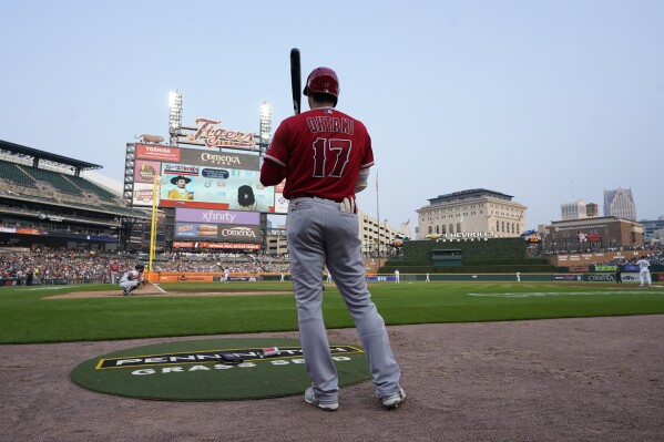 Los Angeles Angels designated hitter Shohei Ohtani prepares to bat during the third inning of a baseball game against the Detroit Tigers, Tuesday, July 25, 2023, in Detroit. (AP Photo/Carlos Osorio)