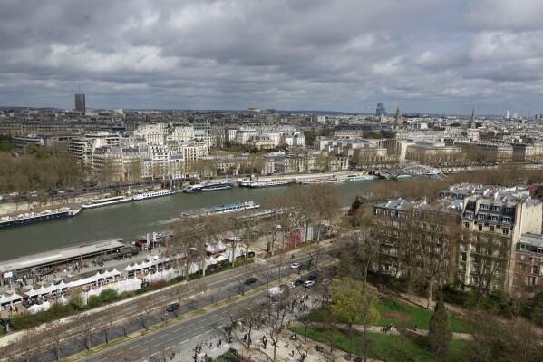 The Seine river is seen Thursday, March 28, 2024 in Paris. The river will host the Paris 2024 Olympic Games opening ceremony with boats for each national delegation. (AP Photo/Aurelien Morissard)
