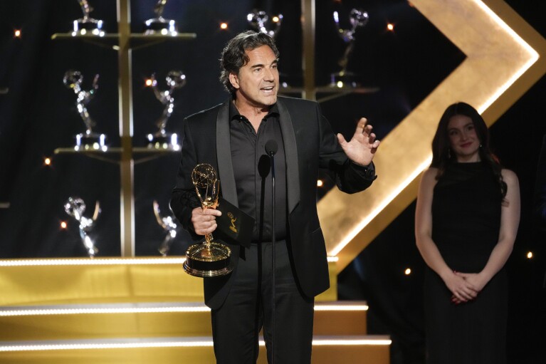 Thorsten Kaye accepts the award for outstanding performance by a lead actor in a daytime drama series for "The Bold and the Beautiful" during the 51st Daytime Emmy Awards on Friday, June 7, 2024, at the Westin Bonaventure in Los Angeles. (AP Photo/Chris Pizzello)