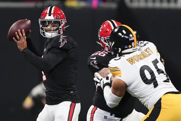 Atlanta Falcons quarterback Marcus Mariota (1) works in the pocket against the Pittsburgh Steelers during the first half of an NFL football game, Sunday, Dec. 4, 2022, in Atlanta. (AP Photo/John Bazemore)