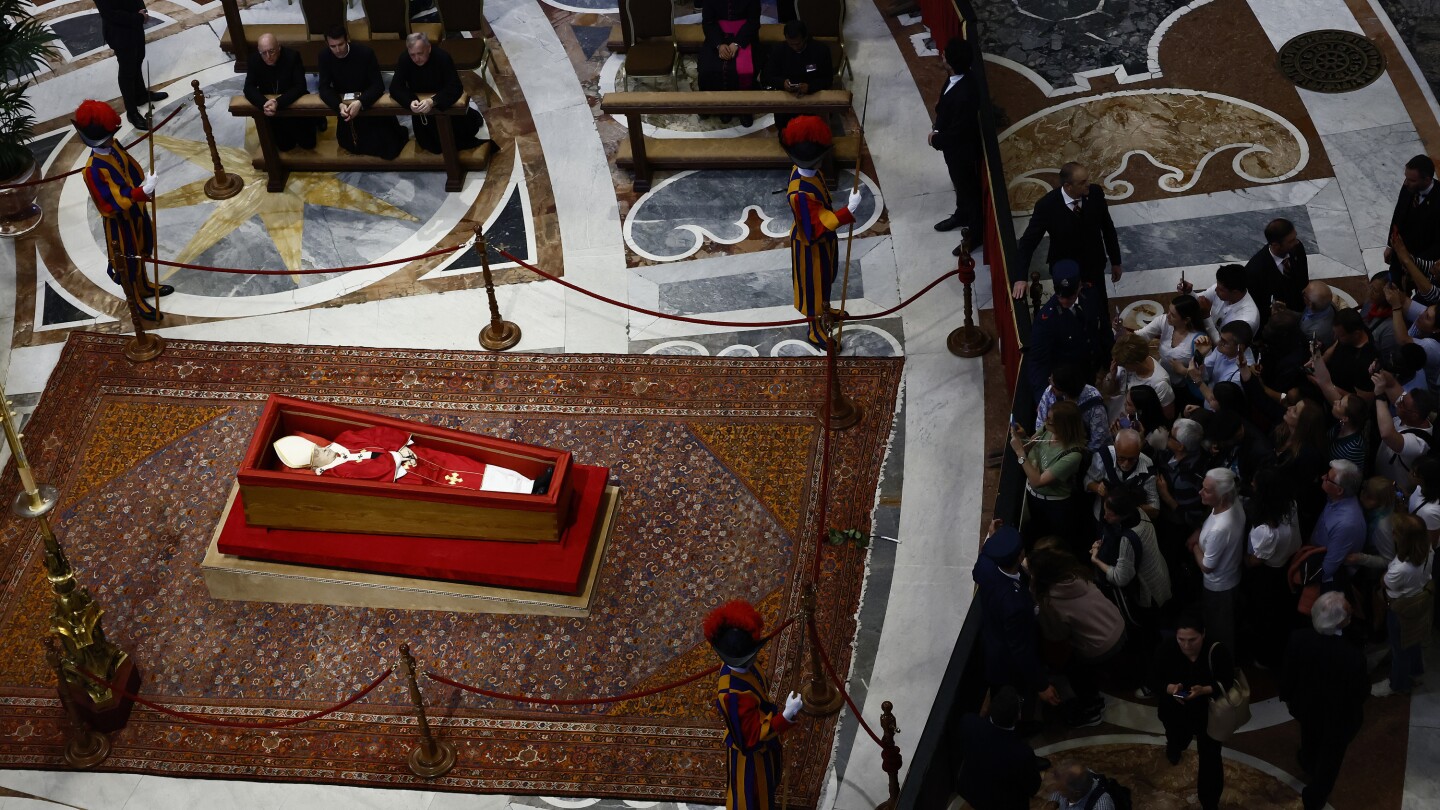 VATICAN CITY AP — Mourners from across the globe made