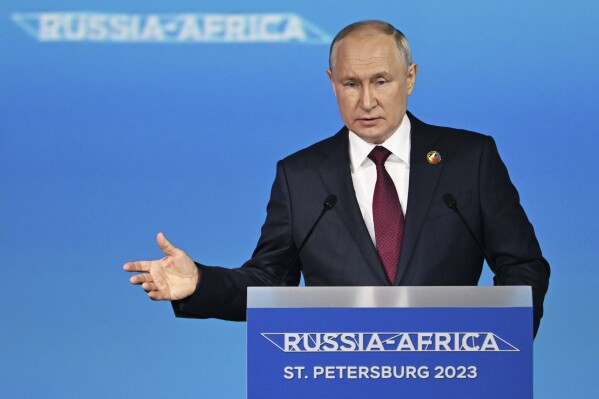 Russian President Vladimir Putin delivers a speech during a plenary session of the Russia-Africa Summit and Economic and Humanitarian Forum in St. Petersburg, Russia, Thursday, July 27, 2023. (Pavel Bednyakov, Sputnik, Kremlin Pool Photo via AP)