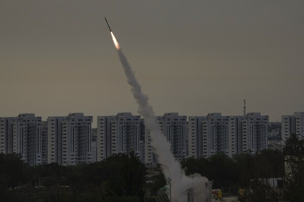 FILE - Israel's Iron Dome anti-missile system fires to intercept a rocket launched from the Gaza Strip towards Israel, near Ashkelon, Israel, Thursday, May 11, 2023. (AP Photo/Ariel Schalit, File)
