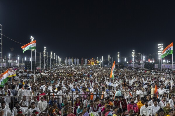 Supporters attend an election rally addressed by Dravida Munnetra Kazhagam (DMK) leader and Chief Minister of Tamil Nadu state, M. K. Stalin, ahead of country's general elections, on the outskirts of southern Indian city of Chennai, April 15, 2024. (AP Photo/Altaf Qadri)