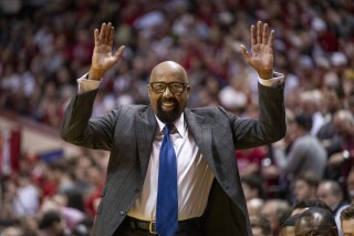 Indiana head coach Mike Woodson gestures toward an official during the second half of an NCAA college basketball game against Purdue, Sunday, Feb. 23, 2025, in Bloomington, Ind. (AP Photo/Doug McSchooler)