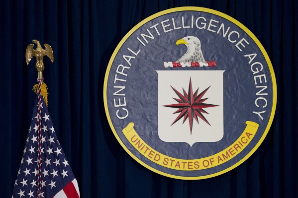 FILE - This April 13, 2016 file photo shows the seal of the Central Intelligence Agency at CIA headquarters in Langley, Va. (AP Photo/Carolyn Kaster, File)